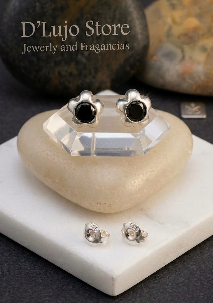 Aretes Broqueles de Flor en Plata Ley 925 con Circonia Central.