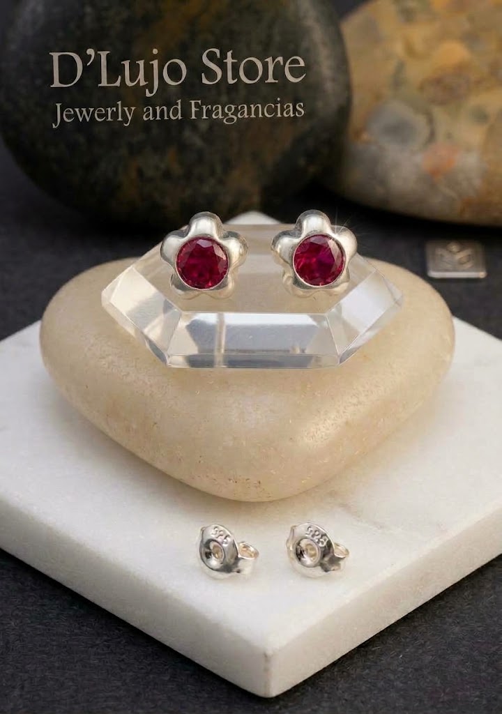 Aretes Broqueles de Flor en Plata Ley 925 con Circonia Central.